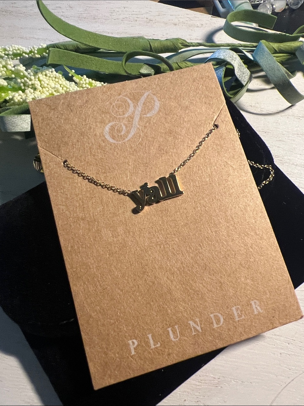 Plunder “y’all” gold tone necklace